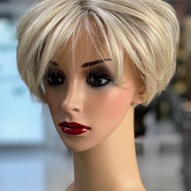 Topper for short hair that matched the client's natural hair (color, texture, density) and blended seemlessly