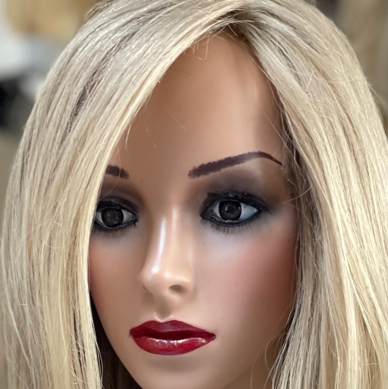 Topper to blend in with client's hair suffereing from thinning / alopecia on top.